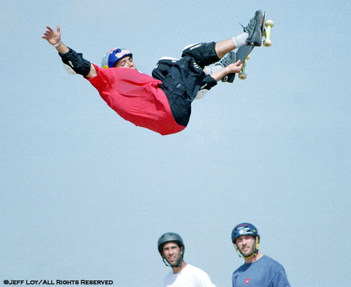 Competitors watch as Brazillian skater Sandro Dias shows his stuff during the EXPN Invitational at GPX Skatepark in Grand Prairie, Texas.